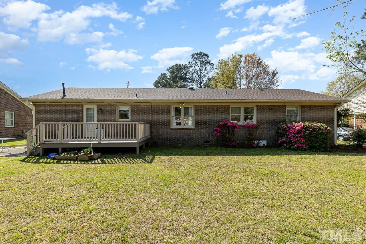 200 Ridge Road Northwest Wilson, NC 27896 - Photo 19 of 25 a front view of house with yard having seating