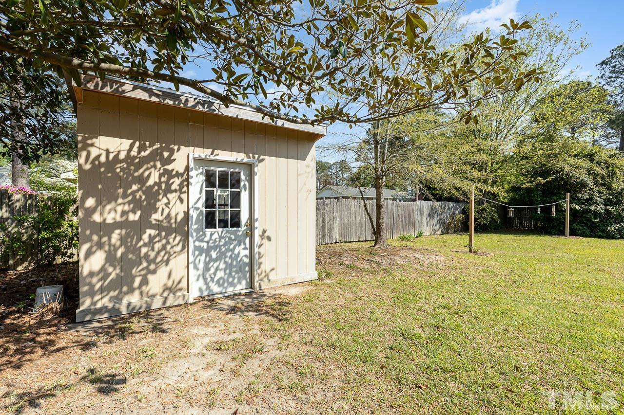 200 Ridge Road Northwest Wilson, NC 27896 - Photo 24 of 25 a view of a yard with a tree