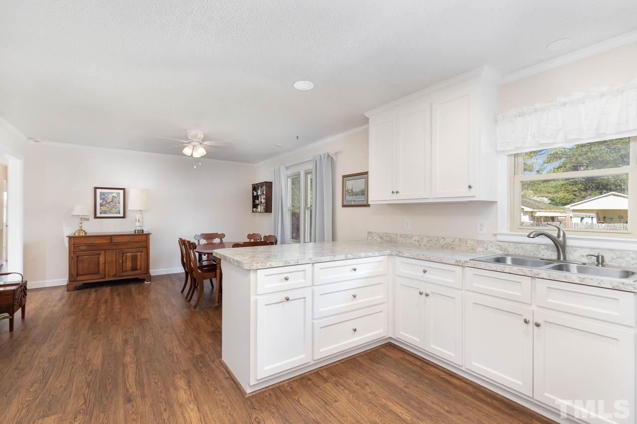 200 Ridge Road Northwest Wilson, NC 27896 - Photo 10 of 25 a kitchen with a sink and cabinets