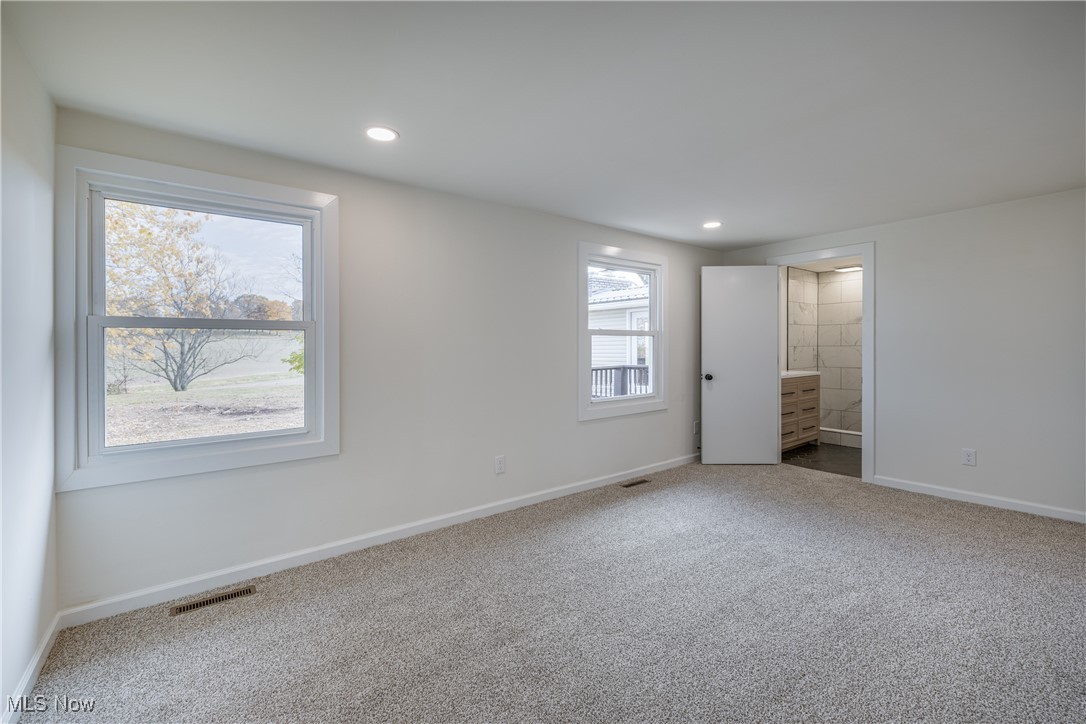 24534 Mill Road Utica, OH 43080 - Photo 11 of 38 Unfurnished bedroom featuring carpet, recessed lighting, and ensuite bathroom