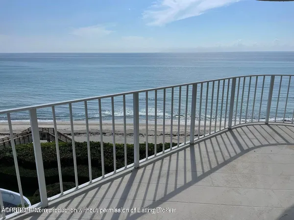 a balcony with an ocean view