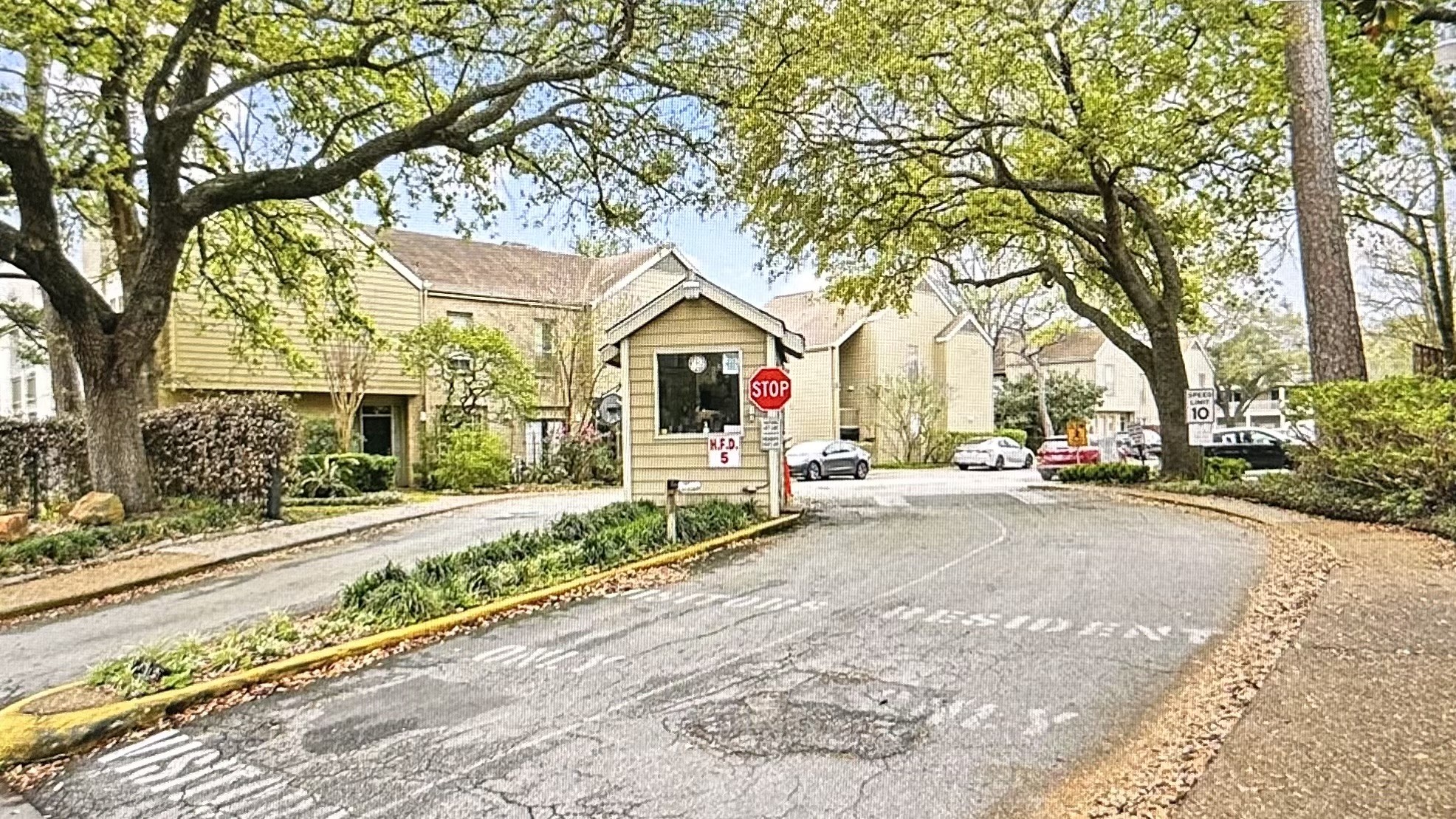 2100 Tanglewilde Street, Unit 531 Houston, TX 77063 - Photo 19 of 25 a front view of a house with a yard and potted plants