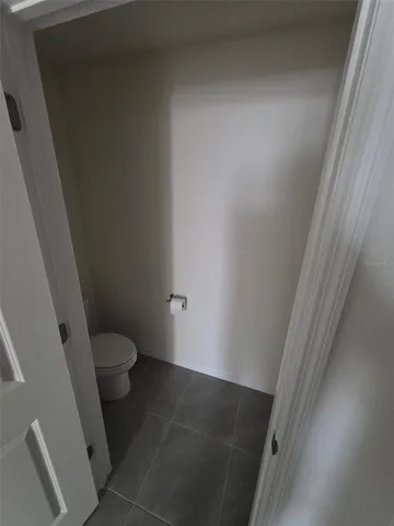 a bathroom with a glass door