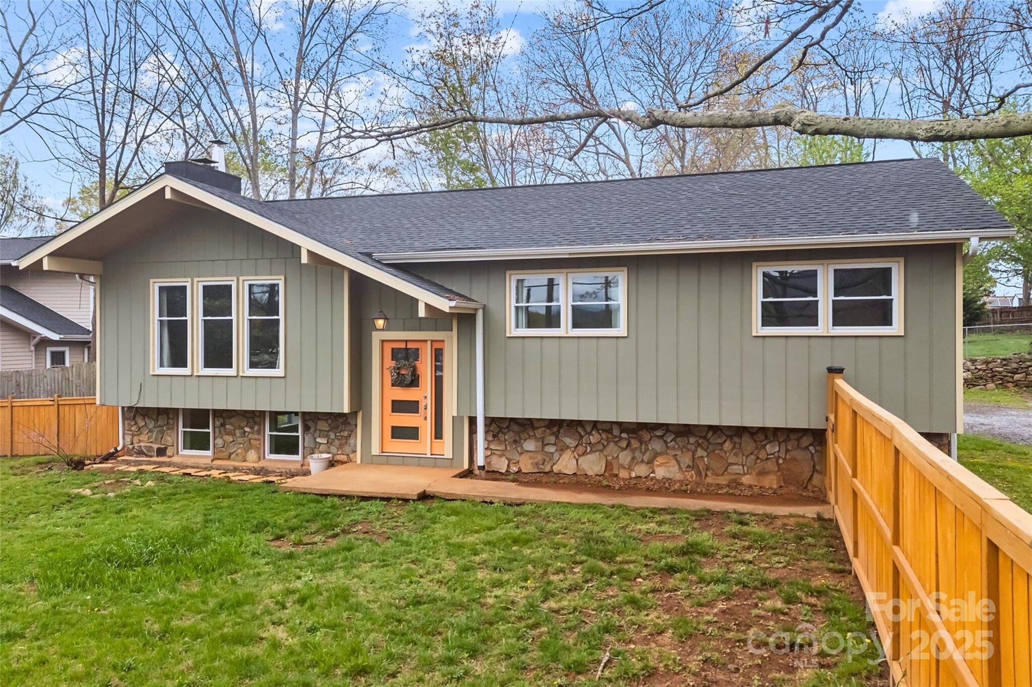 917 West Chapel Road Asheville, NC 28803 - Photo 1 of 28 a front view of a house with a yard