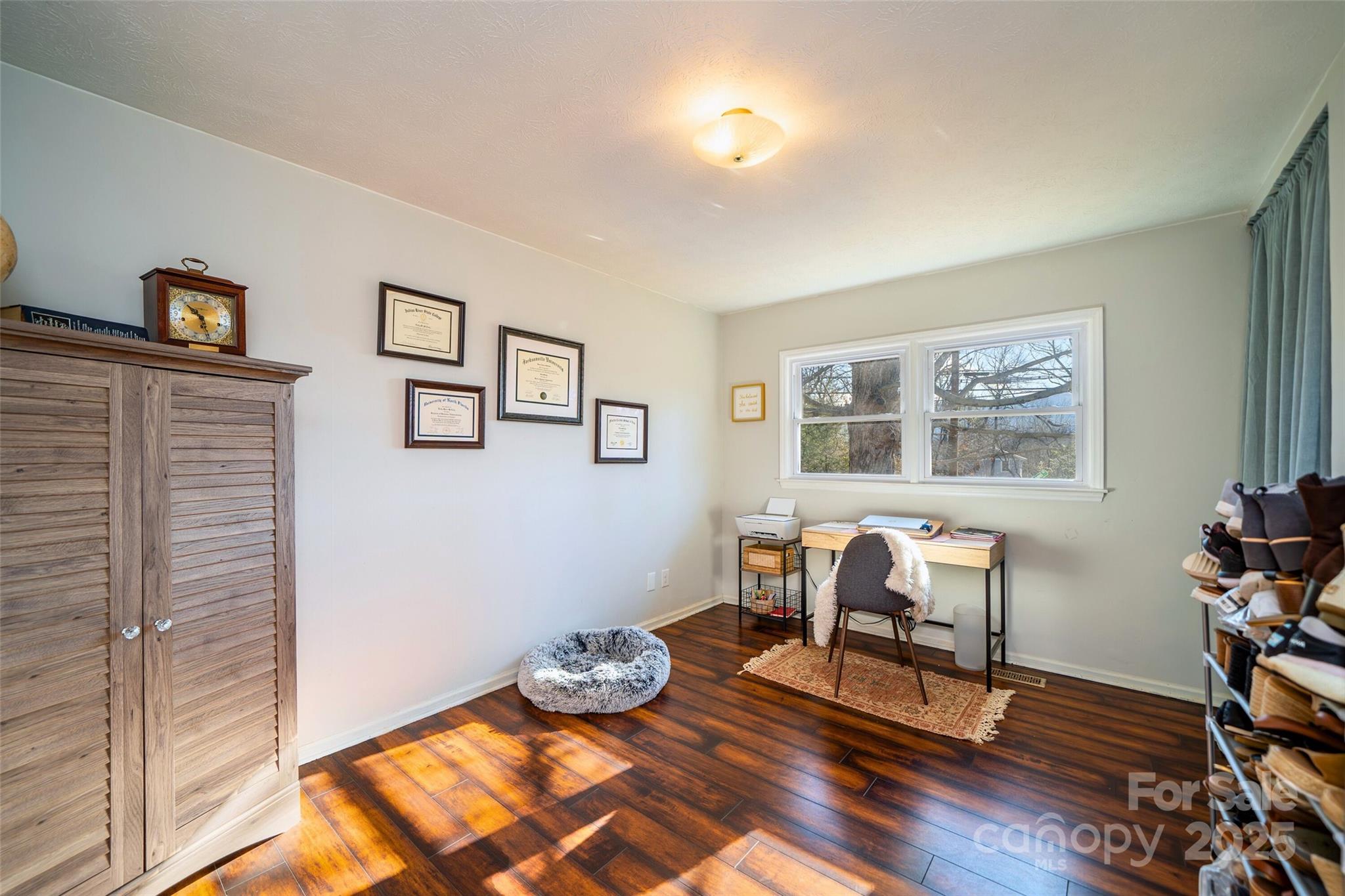917 West Chapel Road Asheville, NC 28803 - Photo 20 of 28 a living room with furniture and wooden floor