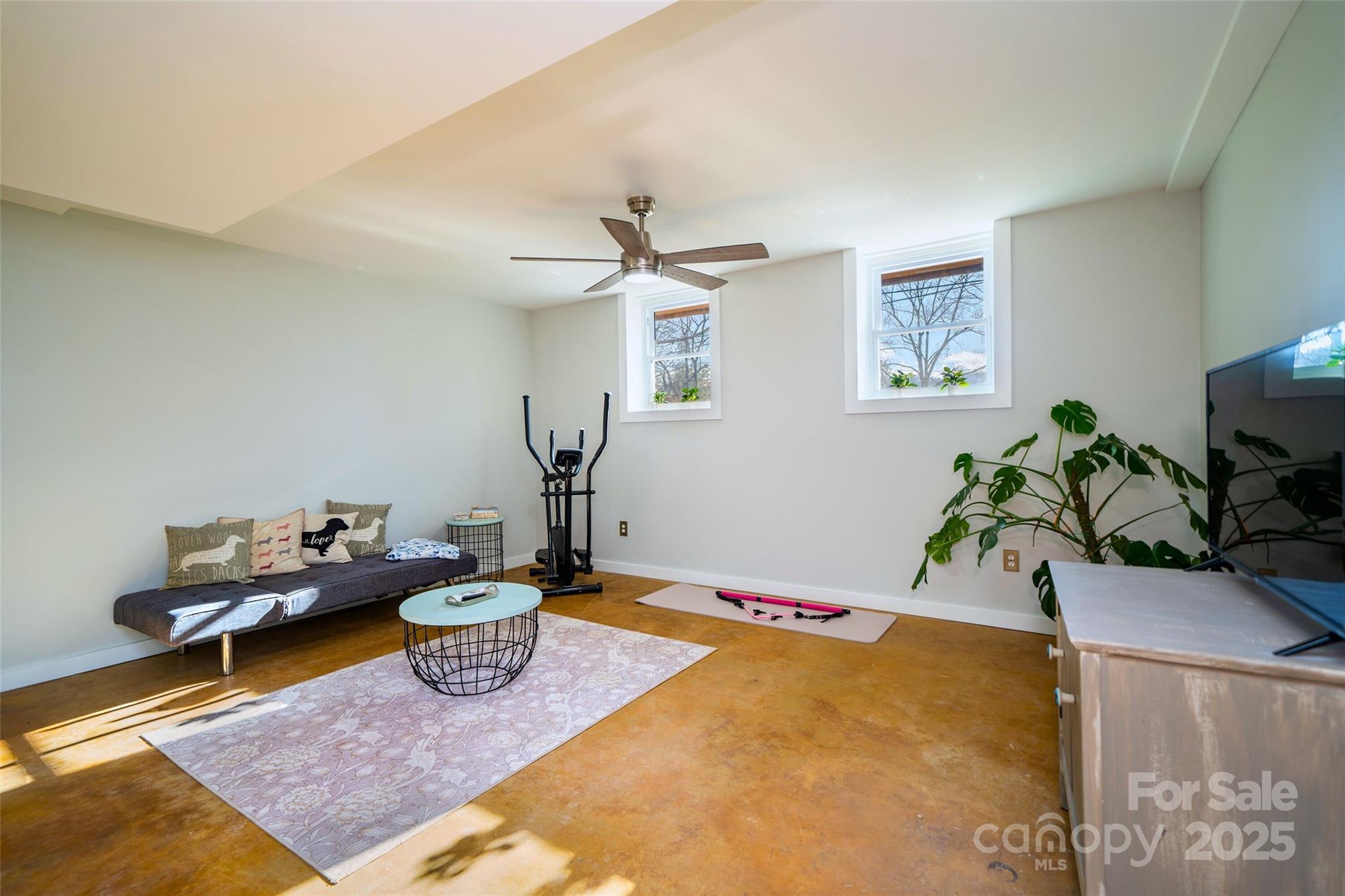 917 West Chapel Road Asheville, NC 28803 - Photo 22 of 28 a living room with furniture and a potted plant