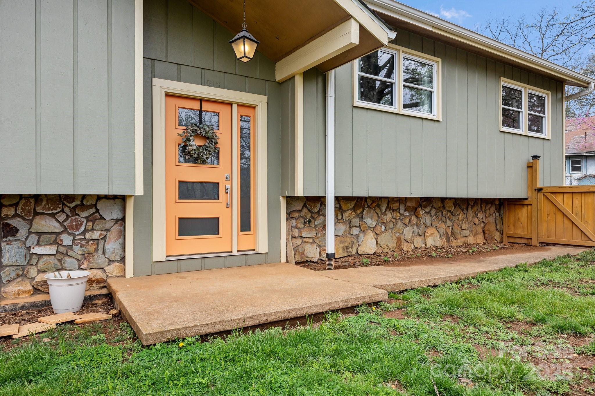 917 West Chapel Road Asheville, NC 28803 - Photo 7 of 28 a front view of a house with a yard