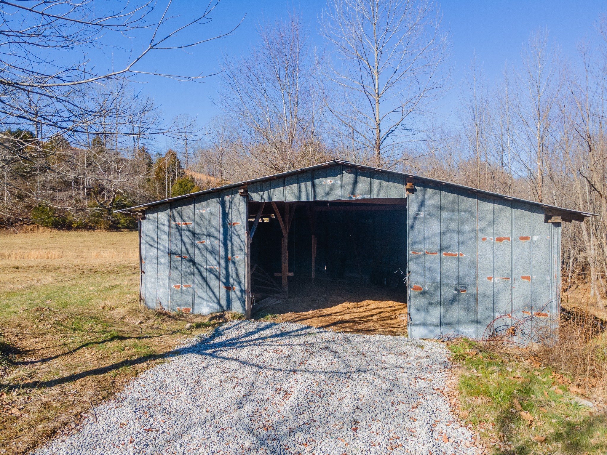 5120 Brison Road Collinwood, TN 38450 - Photo 16 of 25 a view of a house with a snow in the yard