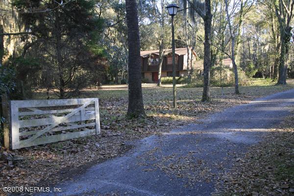 162 Holly Knowe Road Orange Park, FL 32003 - Photo 1 of 6 Front view from entry gate