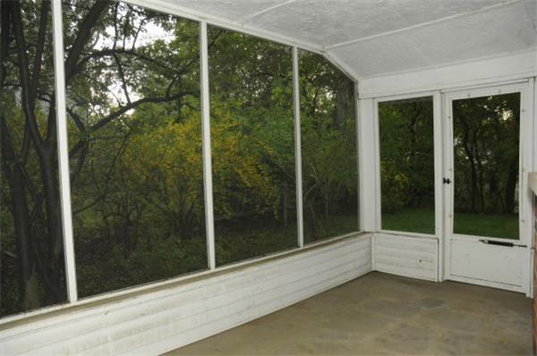 43 Hagen Road Newton, MA 02459 - Photo 25 of 30 a view of a glass door and garden