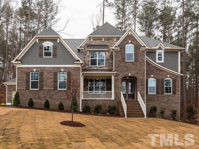With nearly and Acre of Land less than 1 Mile to I540! CARRIAGE GARAGE ALSO!!
