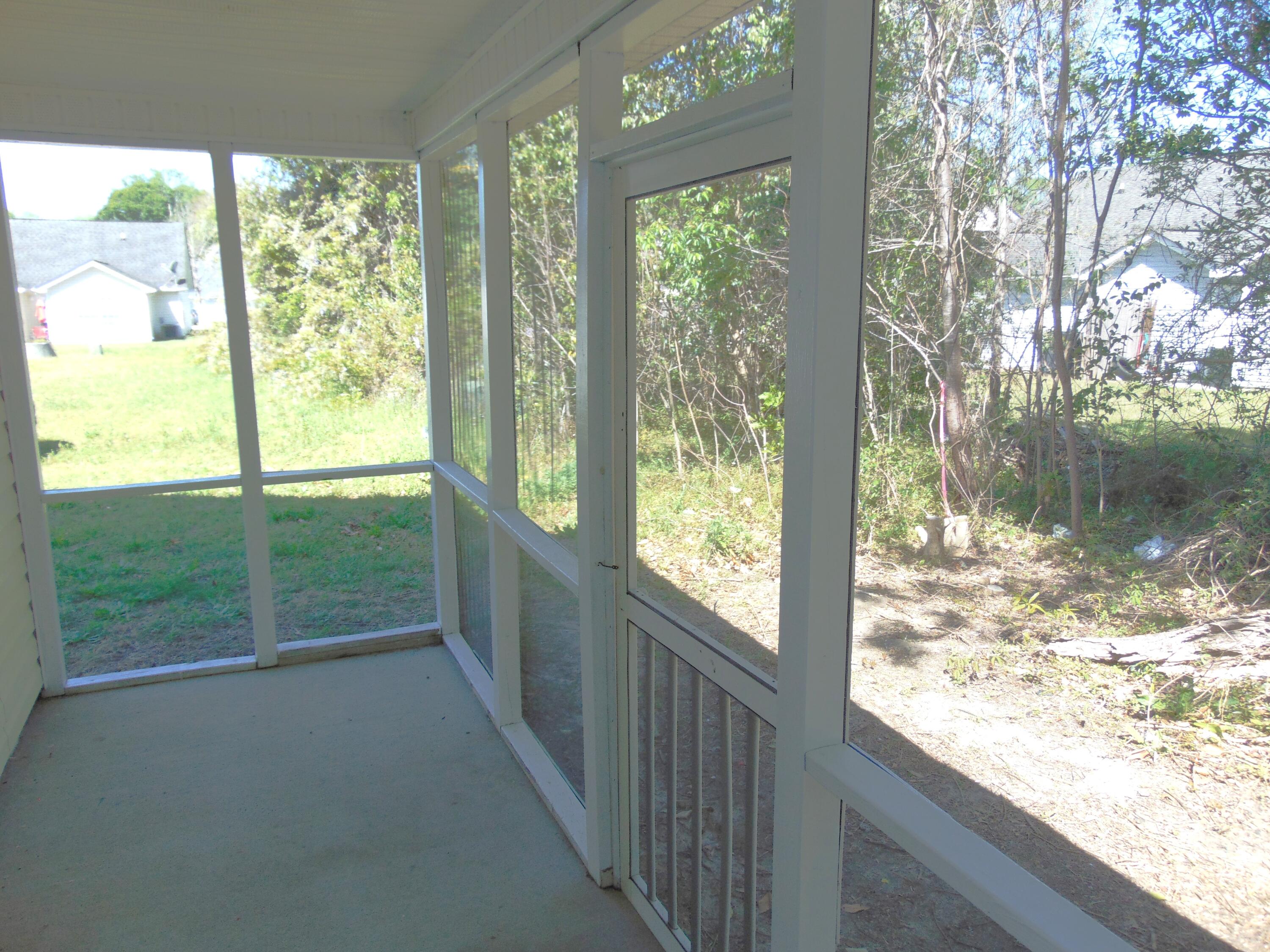 116 Spurrier Way, Unit A Moncks Corner, SC 29461 - Photo 23 of 39 SCREEN PORCH