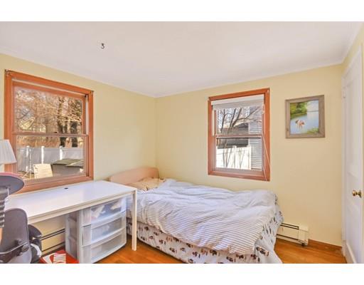 25 Truman Road Newton, MA 02459 - Photo 12 of 19 a bedroom with a bed and a window