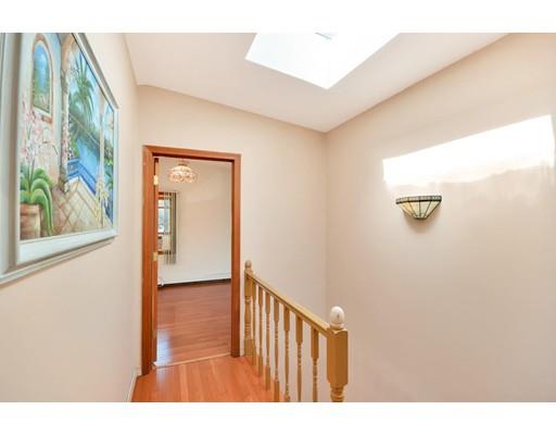 25 Truman Road Newton, MA 02459 - Photo 14 of 19 a view of a hallway with wooden floor