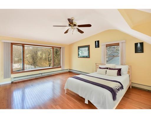 25 Truman Road Newton, MA 02459 - Photo 8 of 19 a bedroom with a bed and a large window