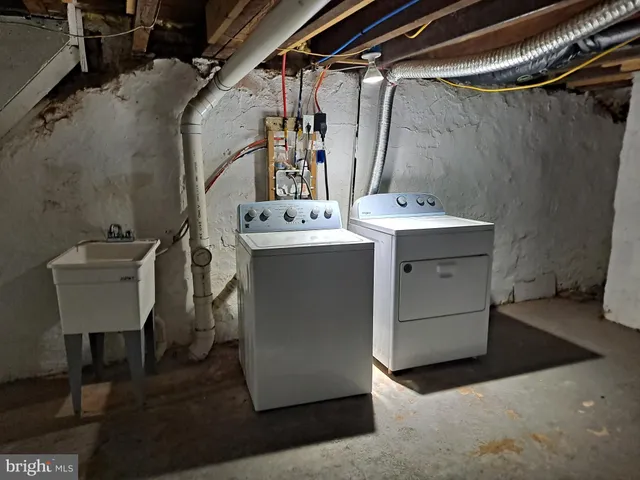 a view of a room with rack and bicycle