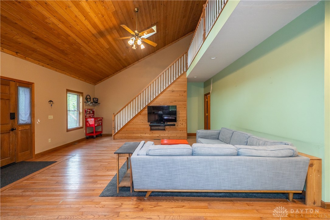 10584 New Biddinger Road Harrison, OH 45030 - Photo 13 of 61 This inviting interior features high ceilings and rich wood flooring.