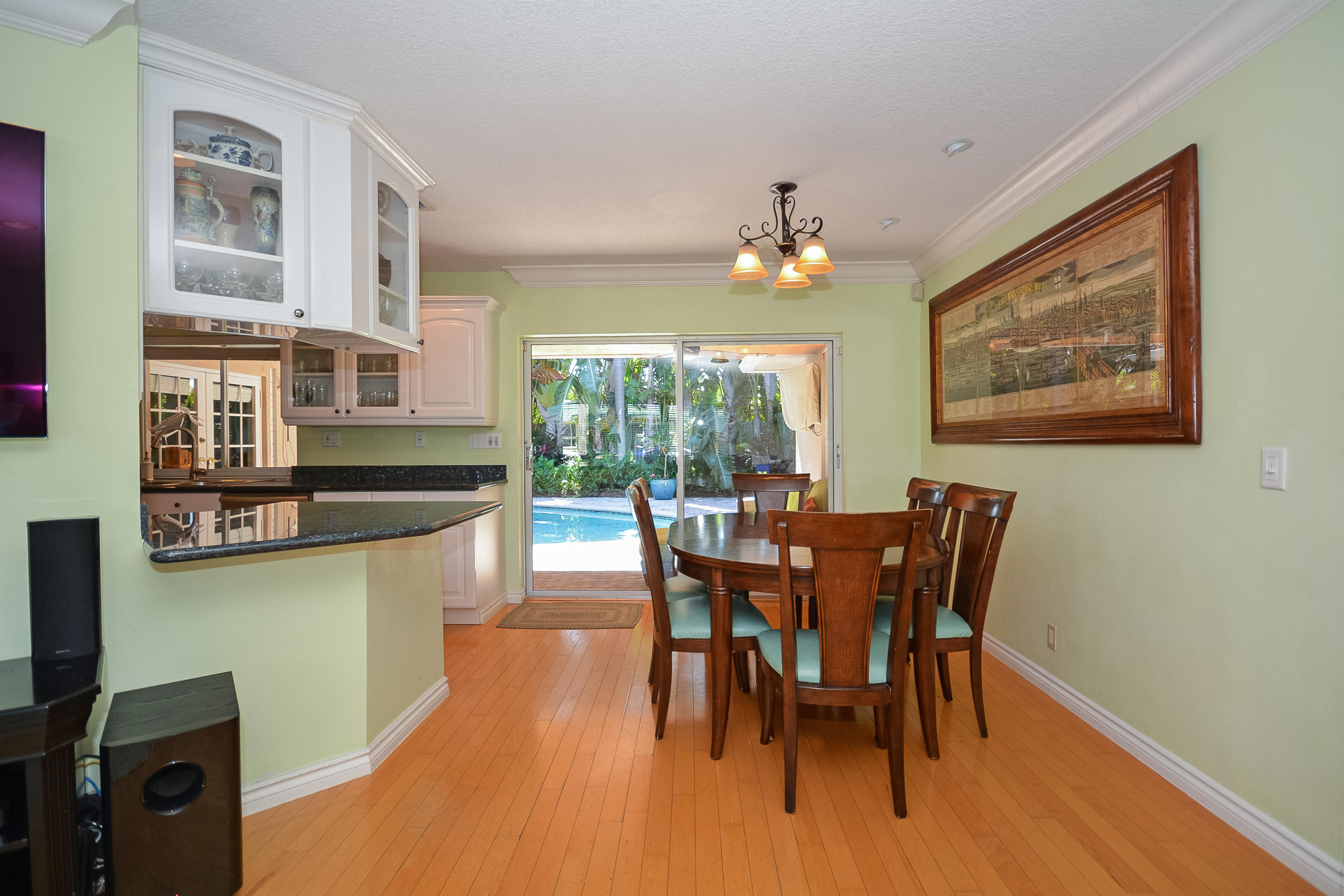 856 Appleby Street Boca Raton, FL 33487 - Photo 12 of 30 a view of a dining room with furniture and wooden floor