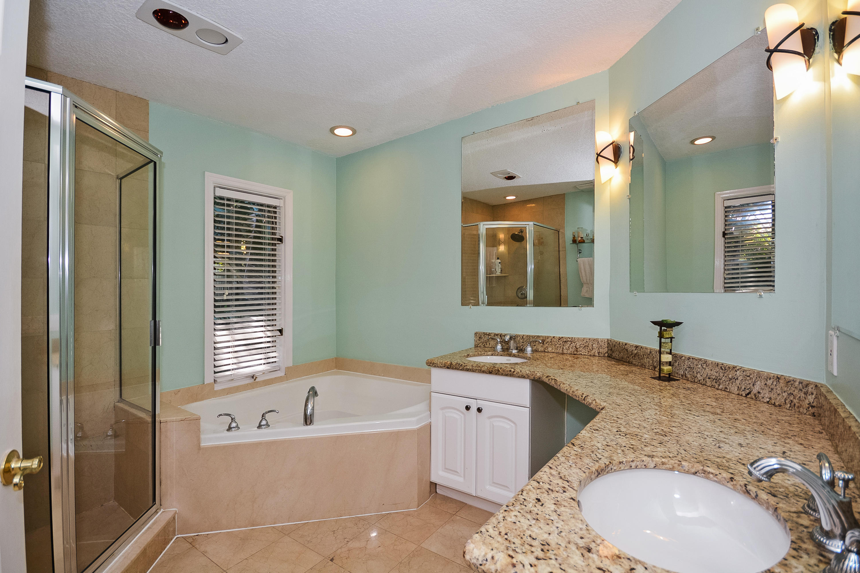 856 Appleby Street Boca Raton, FL 33487 - Photo 20 of 30 a en suite bathroom with a granite countertop tub sink and mirror
