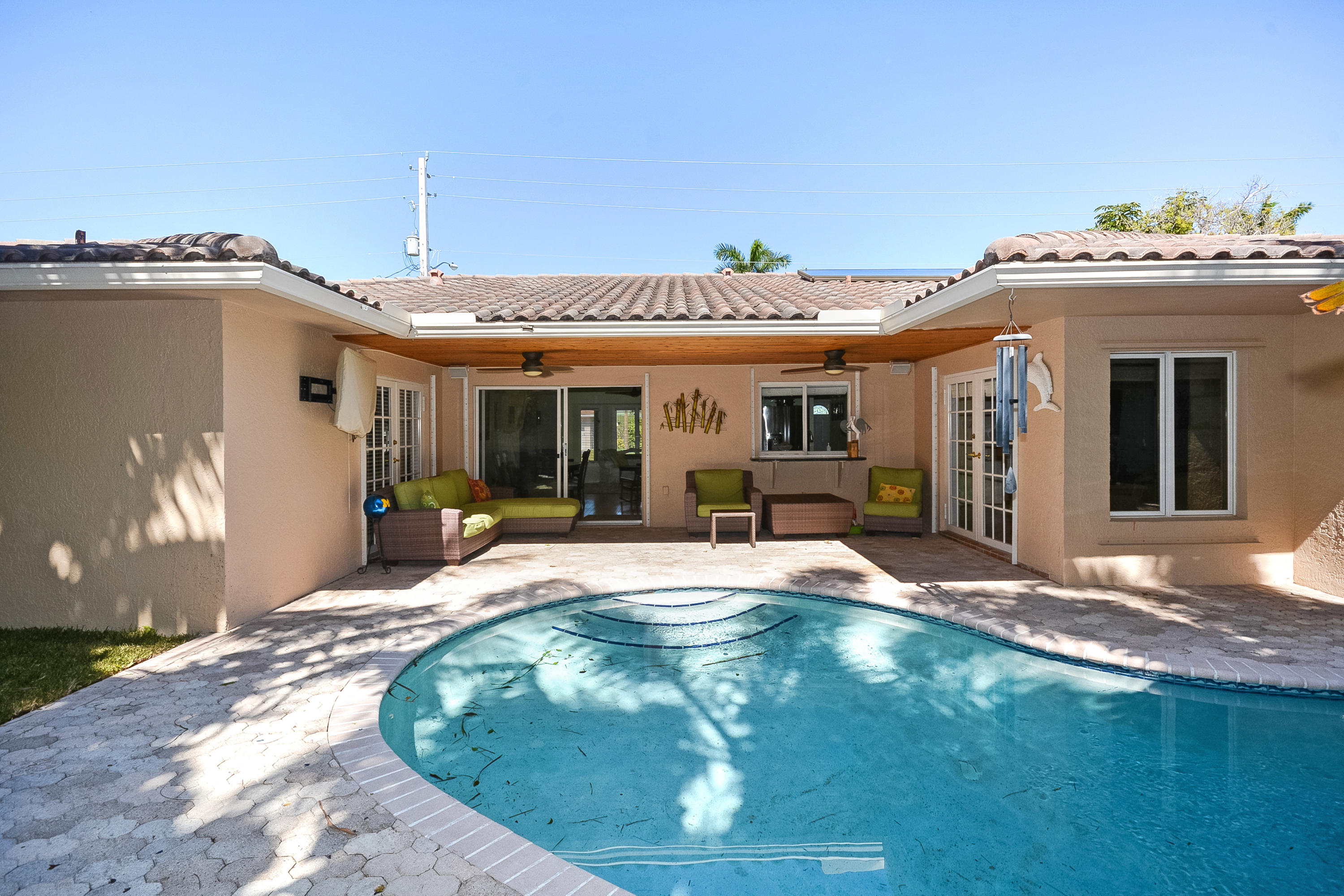 856 Appleby Street Boca Raton, FL 33487 - Photo 26 of 30 a view of a house with sitting area and garden