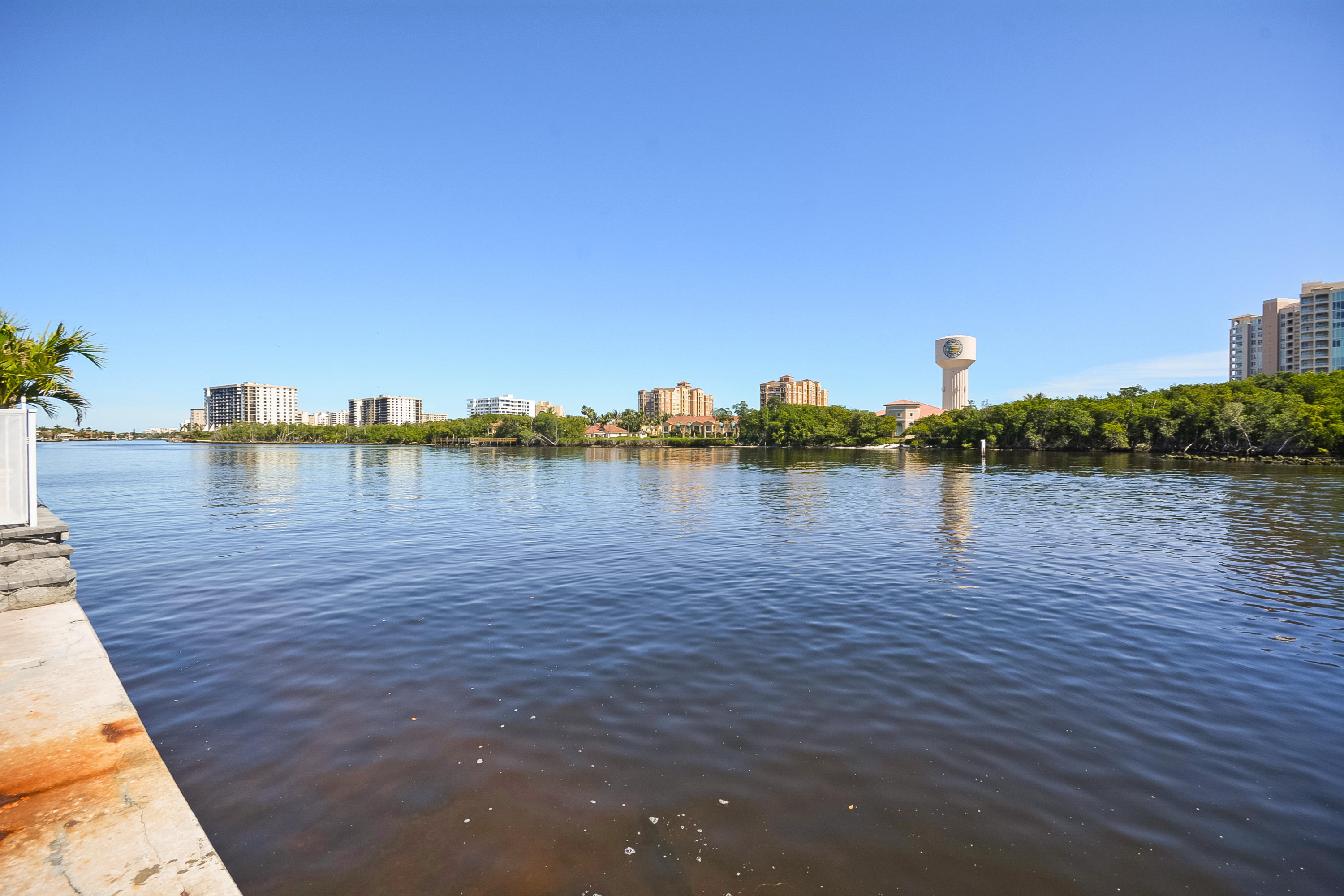 856 Appleby Street Boca Raton, FL 33487 - Photo 30 of 30 a view of a lake with houses in the background