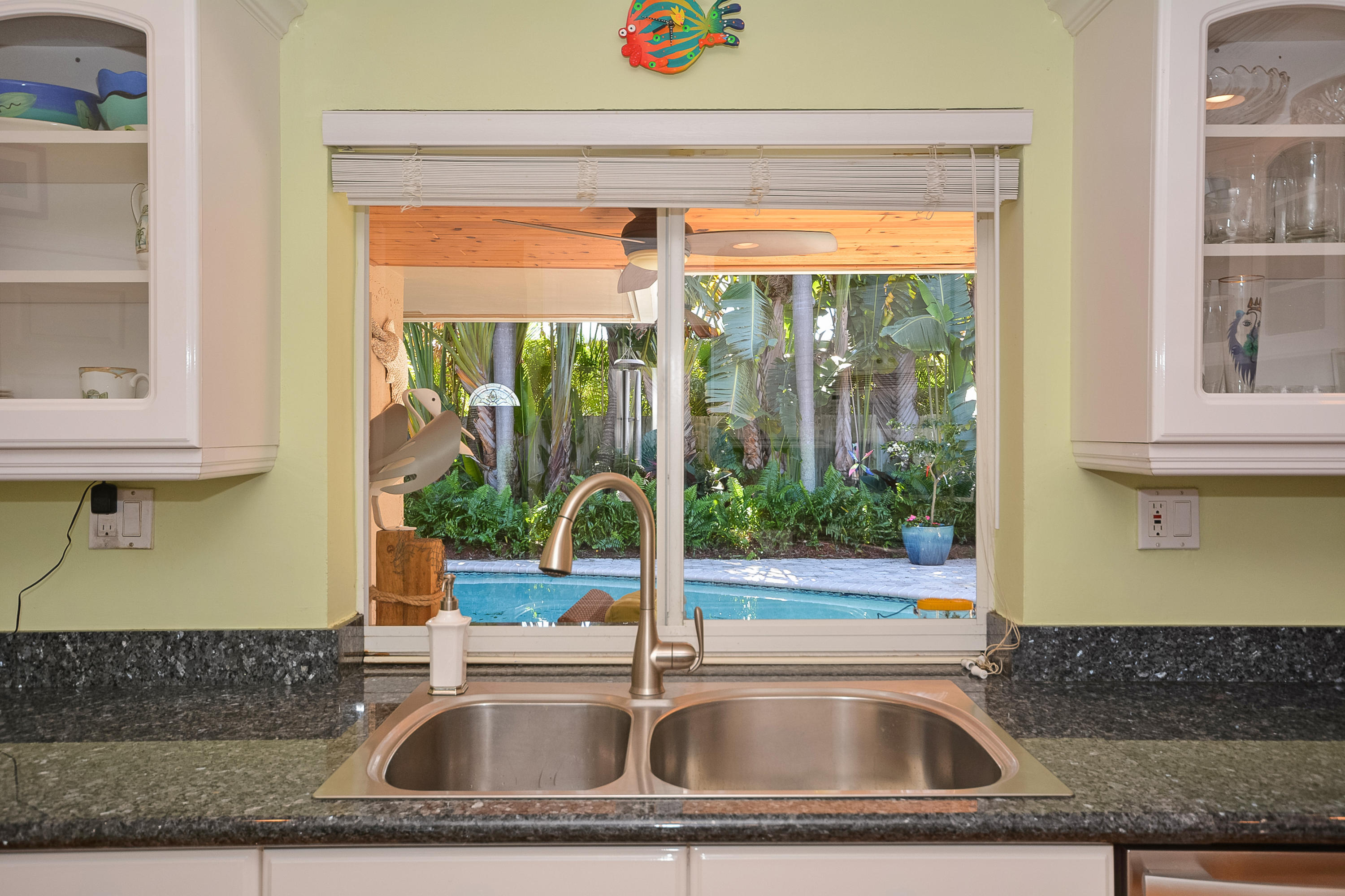 856 Appleby Street Boca Raton, FL 33487 - Photo 7 of 30 a kitchen sink sitting next to a window