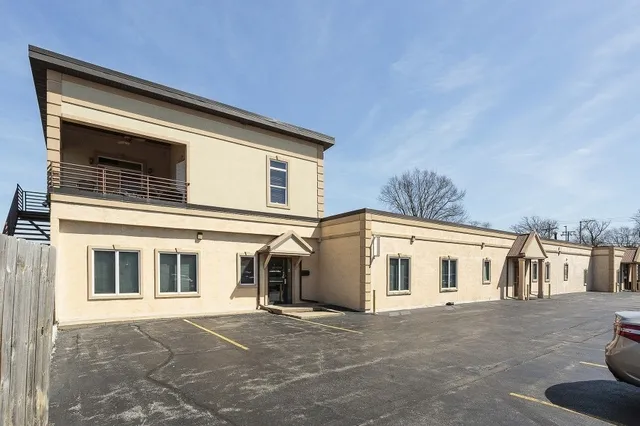 a large white building with a large window