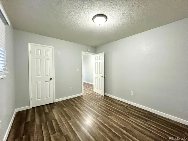 a view of a house with a tree