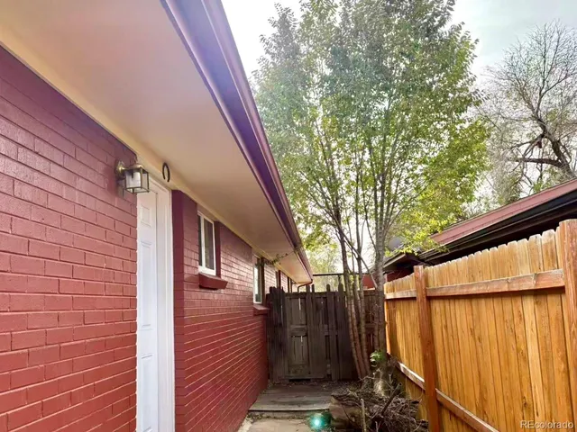 a view of a pathway with a balcony