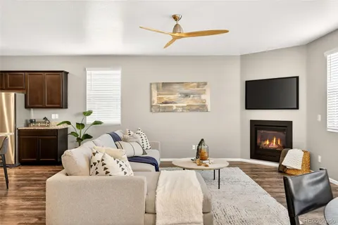 a living room with a fireplace