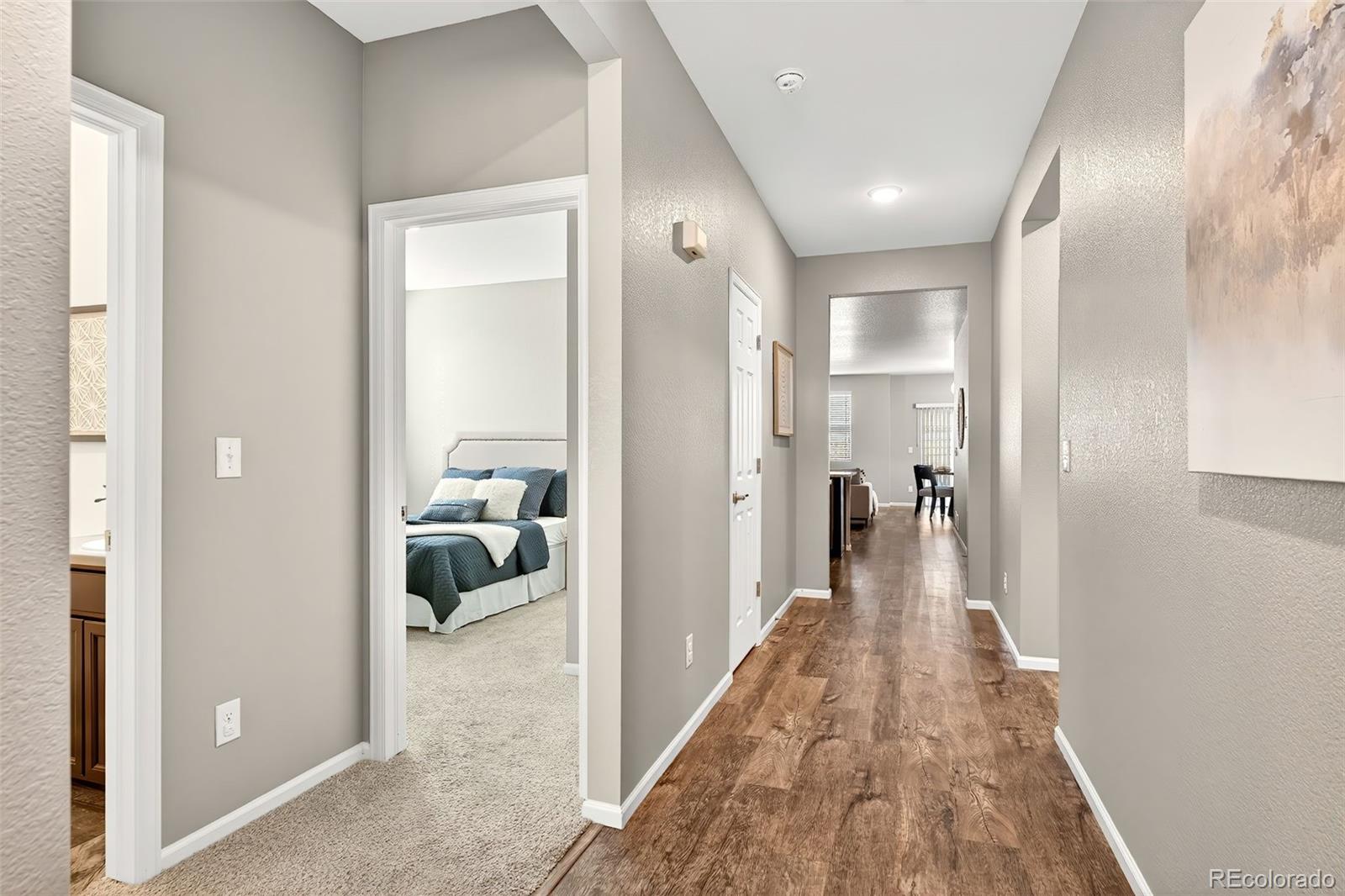 22603 East Radcliff Drive Aurora, CO 80015 - Photo 5 of 42 a hallway with view of living room