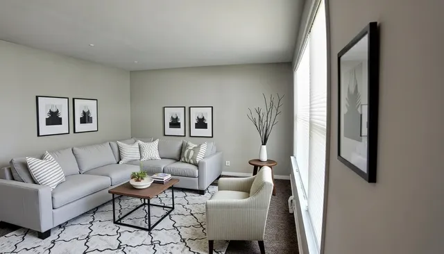 a living room with furniture and a window