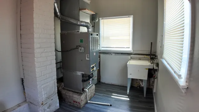 a view of storage and utility room with washer and dryer