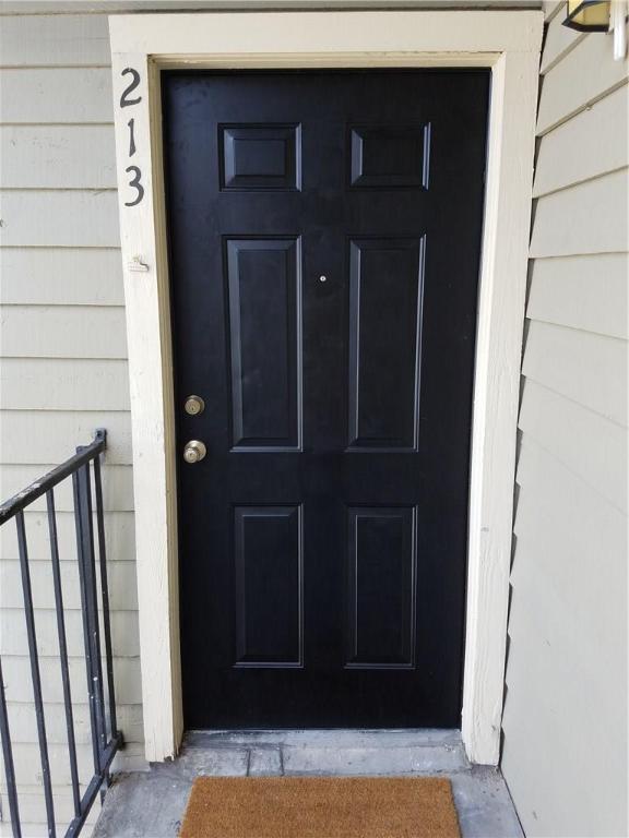 12166 Metric Boulevard, Unit 213 Austin, TX 78758 - Photo 11 of 11 a view of front door