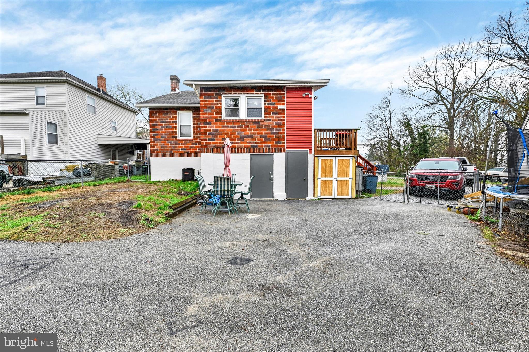 4630 Magnolia Avenue Baltimore, MD 21227 - Photo 30 of 31 a view of multiple houses with a yard