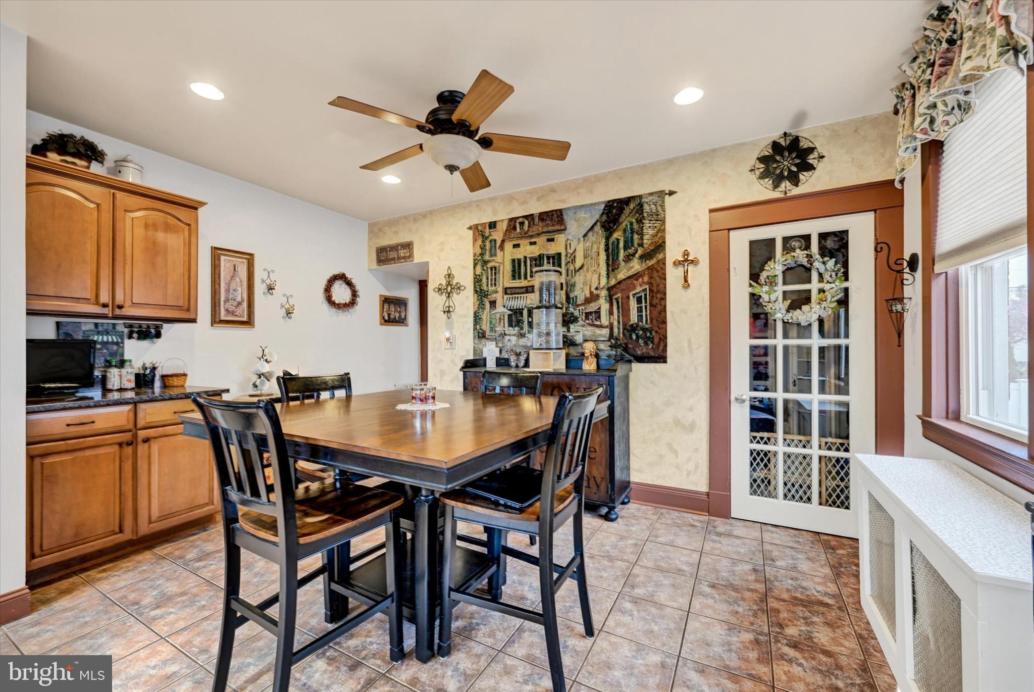 4630 Magnolia Avenue Baltimore, MD 21227 - Photo 9 of 31 a view of a dining room with furniture