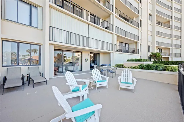 a view of a building with sitting area