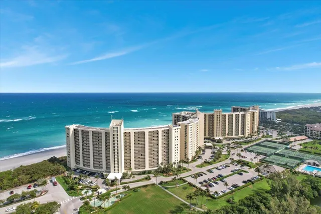 a view of a balcony with an ocean view