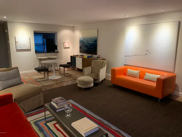 a kitchen with stainless steel appliances granite countertop a refrigerator stove and sink