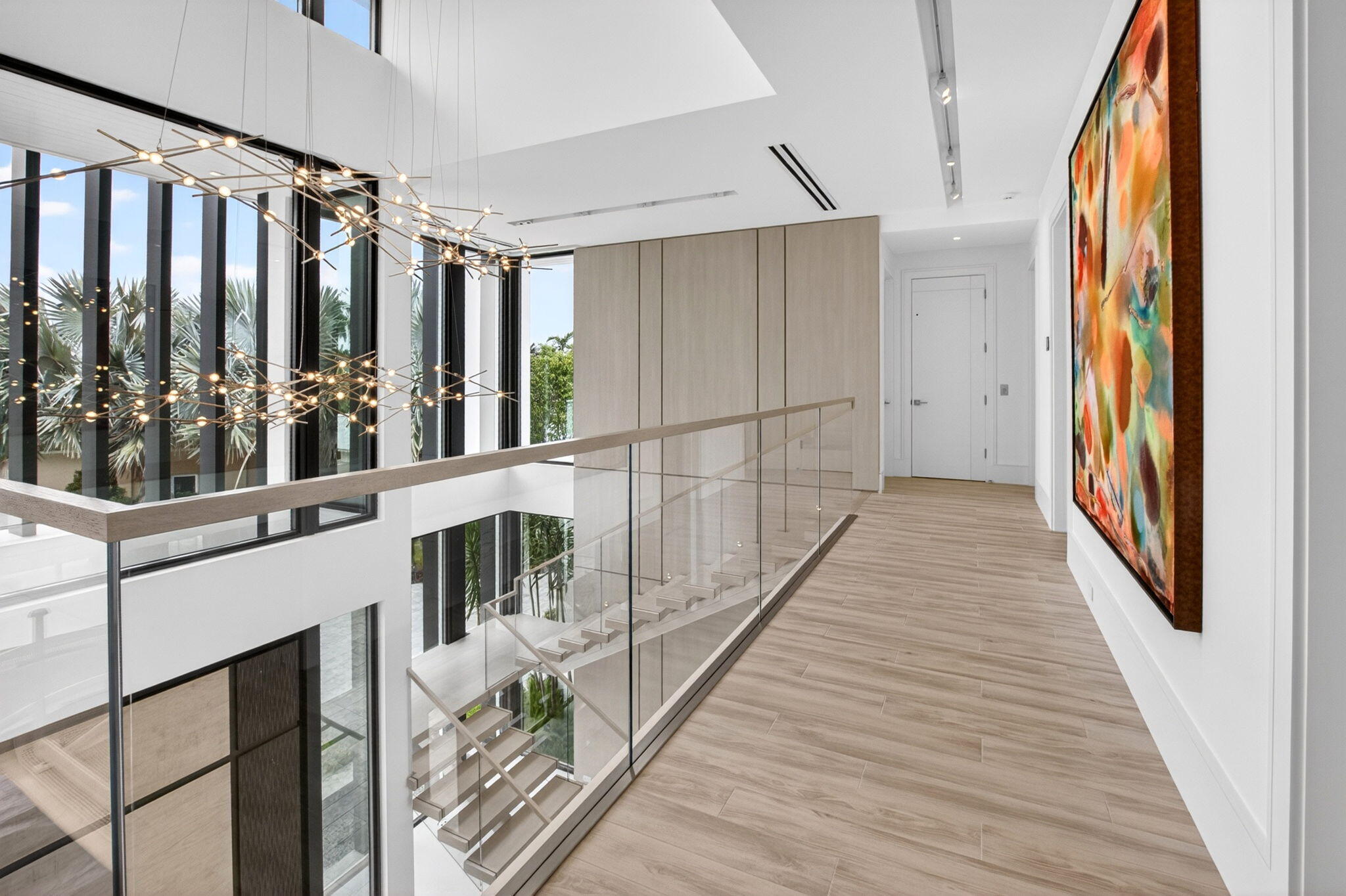 6960 Lake Estates Court Boca Raton, FL 33496 - Photo 32 of 58 a view of balcony with wooden floor