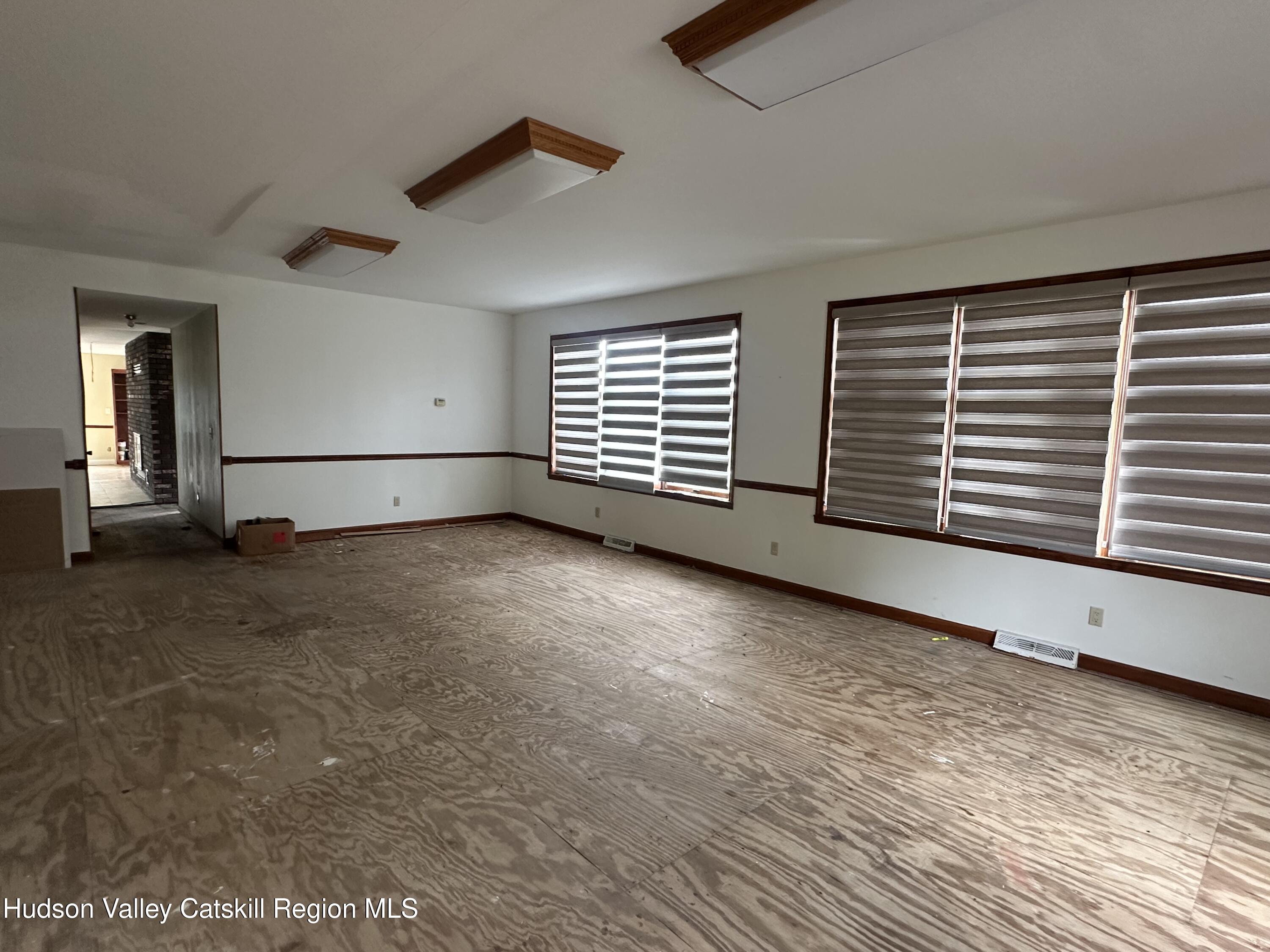 90 Ingalside Road Greenville, NY 12083 - Photo 12 of 36 a view of an empty room with a window