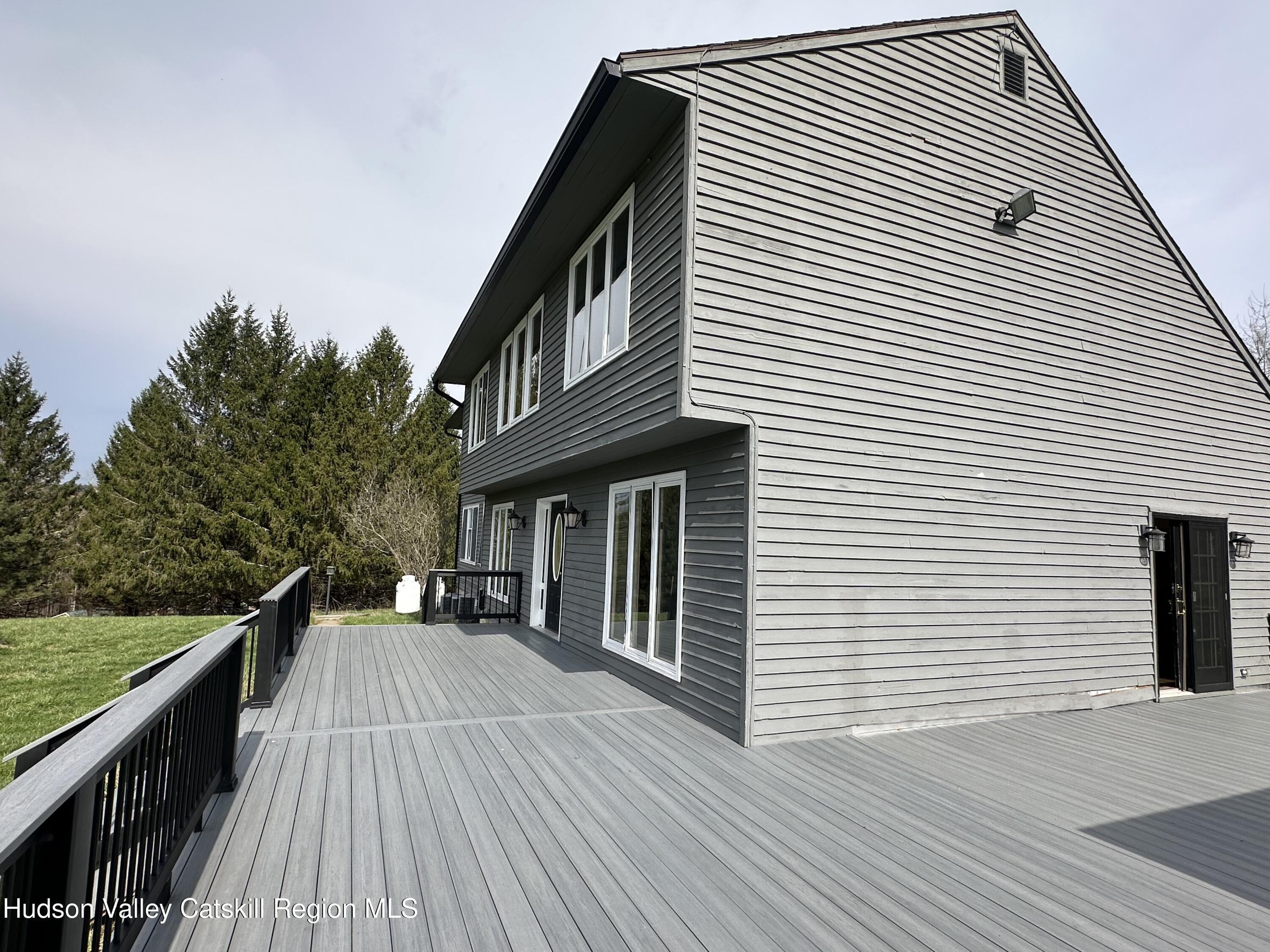 90 Ingalside Road Greenville, NY 12083 - Photo 2 of 36 a view of a house with backyard and deck