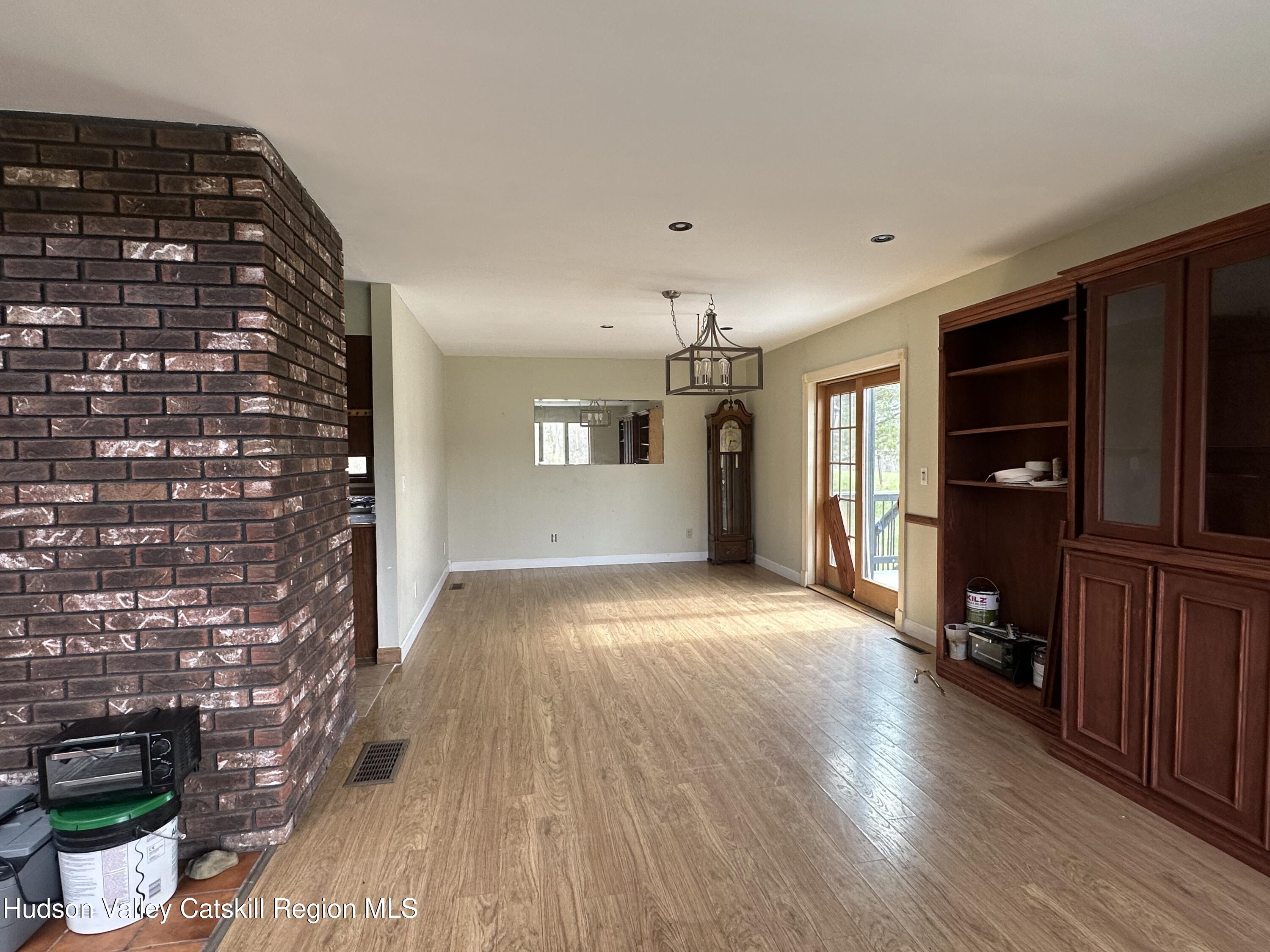 90 Ingalside Road Greenville, NY 12083 - Photo 7 of 36 a view of empty room with wooden floor and cabinet