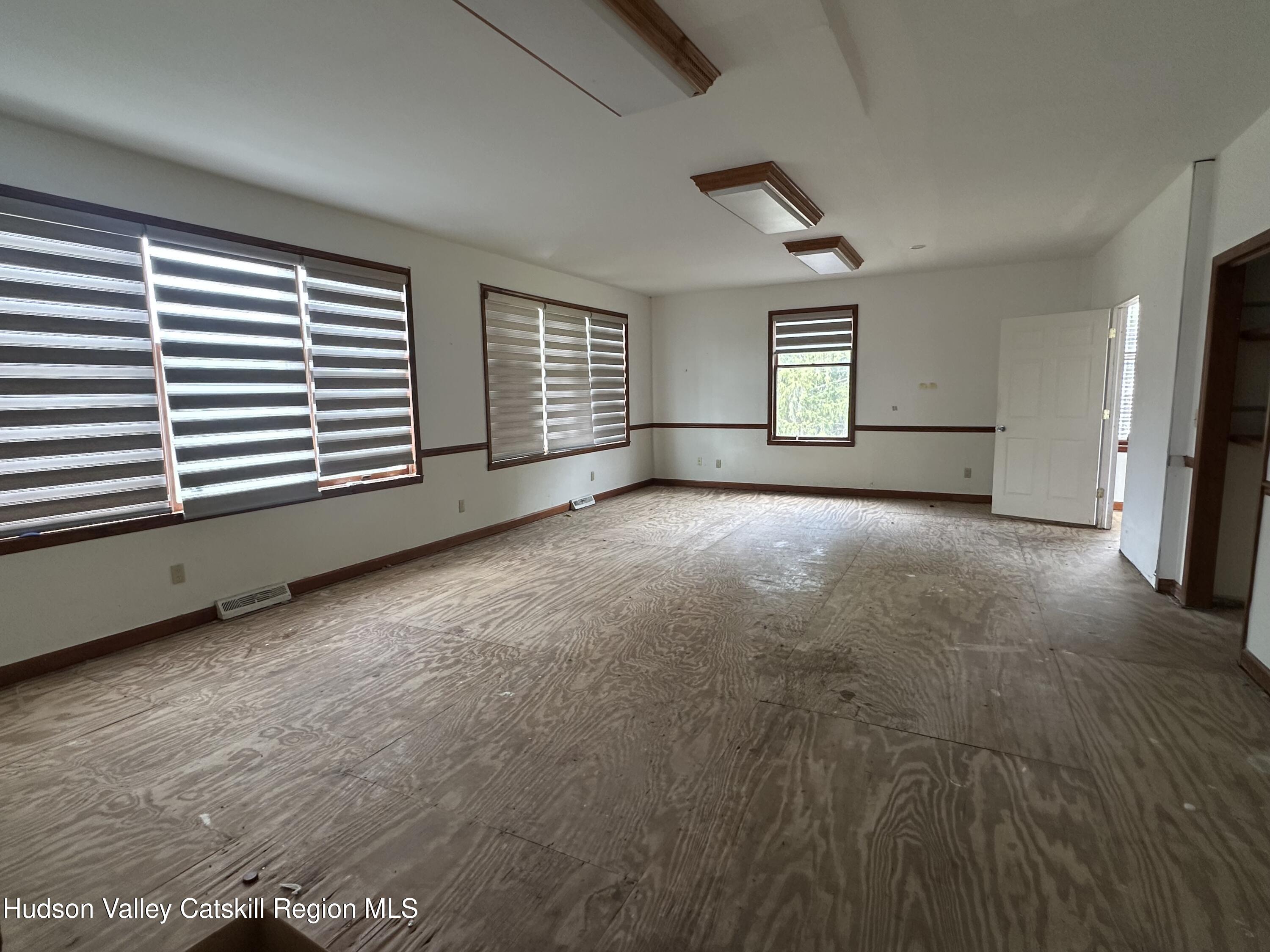 90 Ingalside Road Greenville, NY 12083 - Photo 9 of 36 an empty room with windows and closet