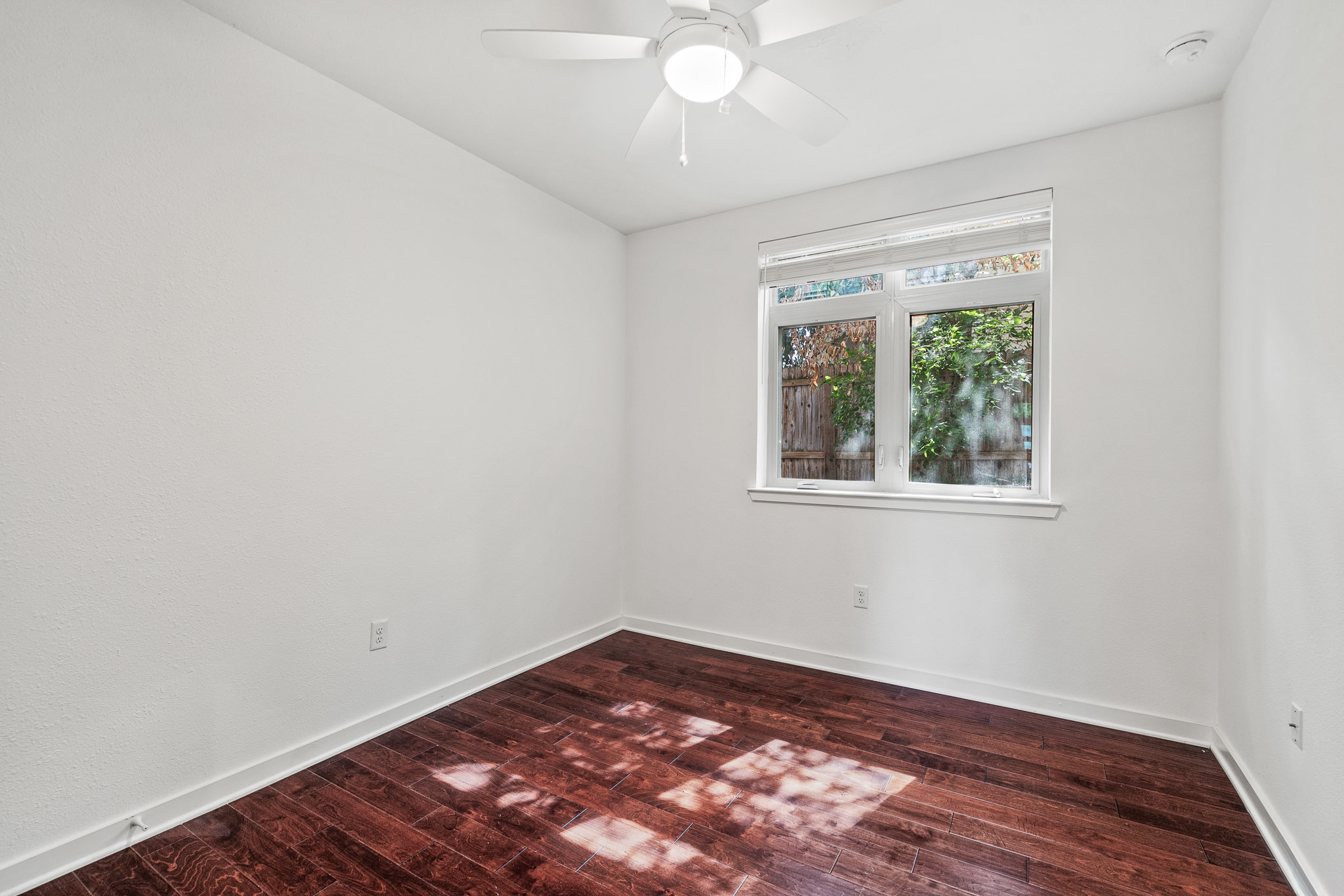 6700 Menchaca Road, Unit 12 Austin, TX 78745 - Photo 4 of 20 an empty room with a window