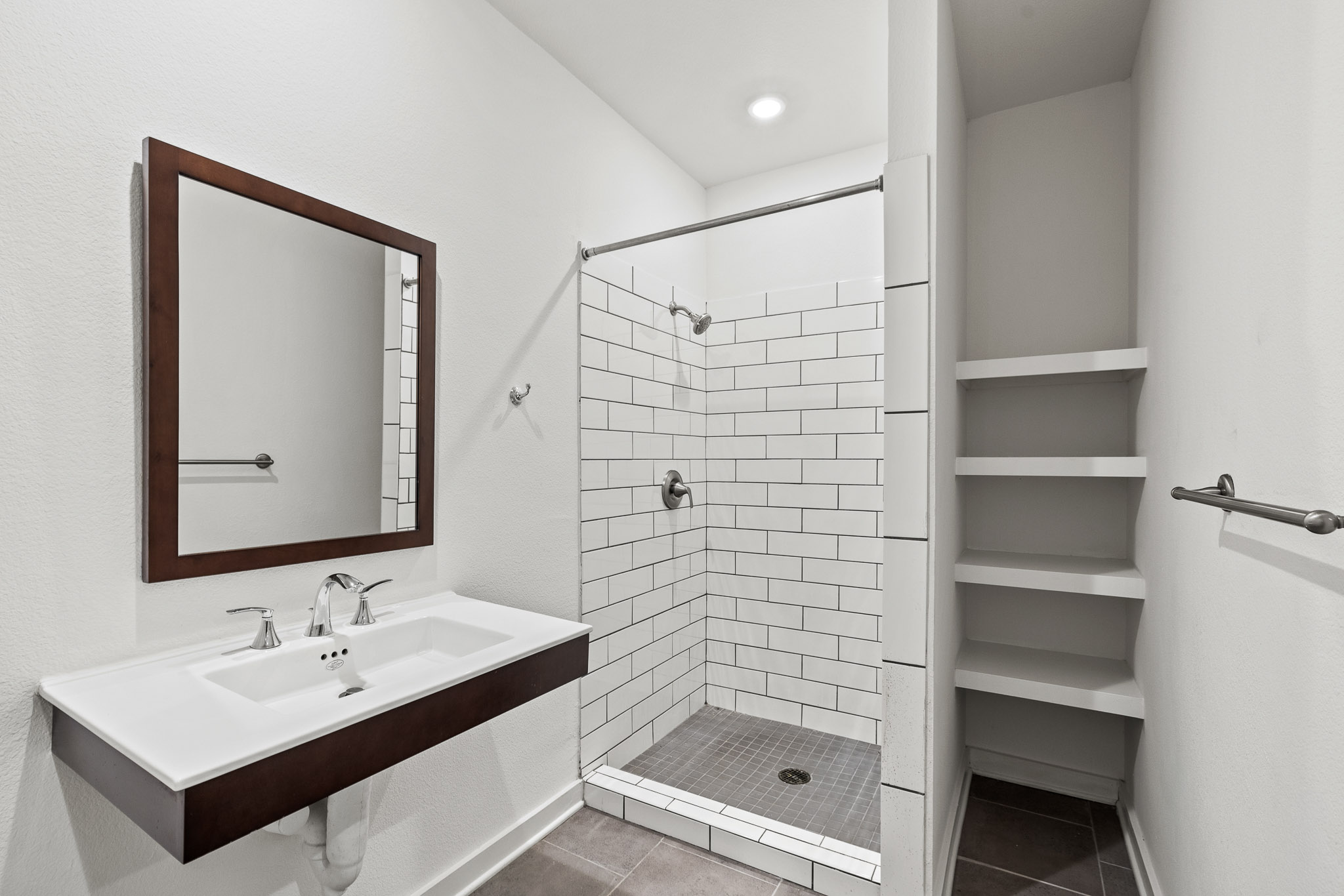 6700 Menchaca Road, Unit 12 Austin, TX 78745 - Photo 5 of 20 a bathroom with a sink and a mirror