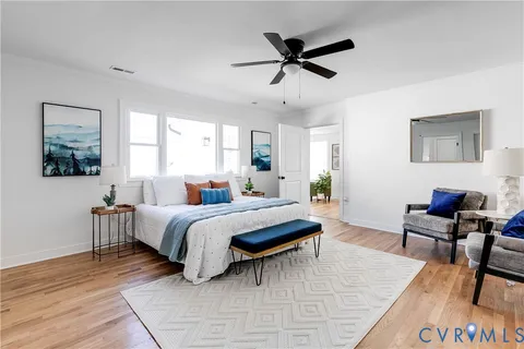 a bed room with a bed and a couch