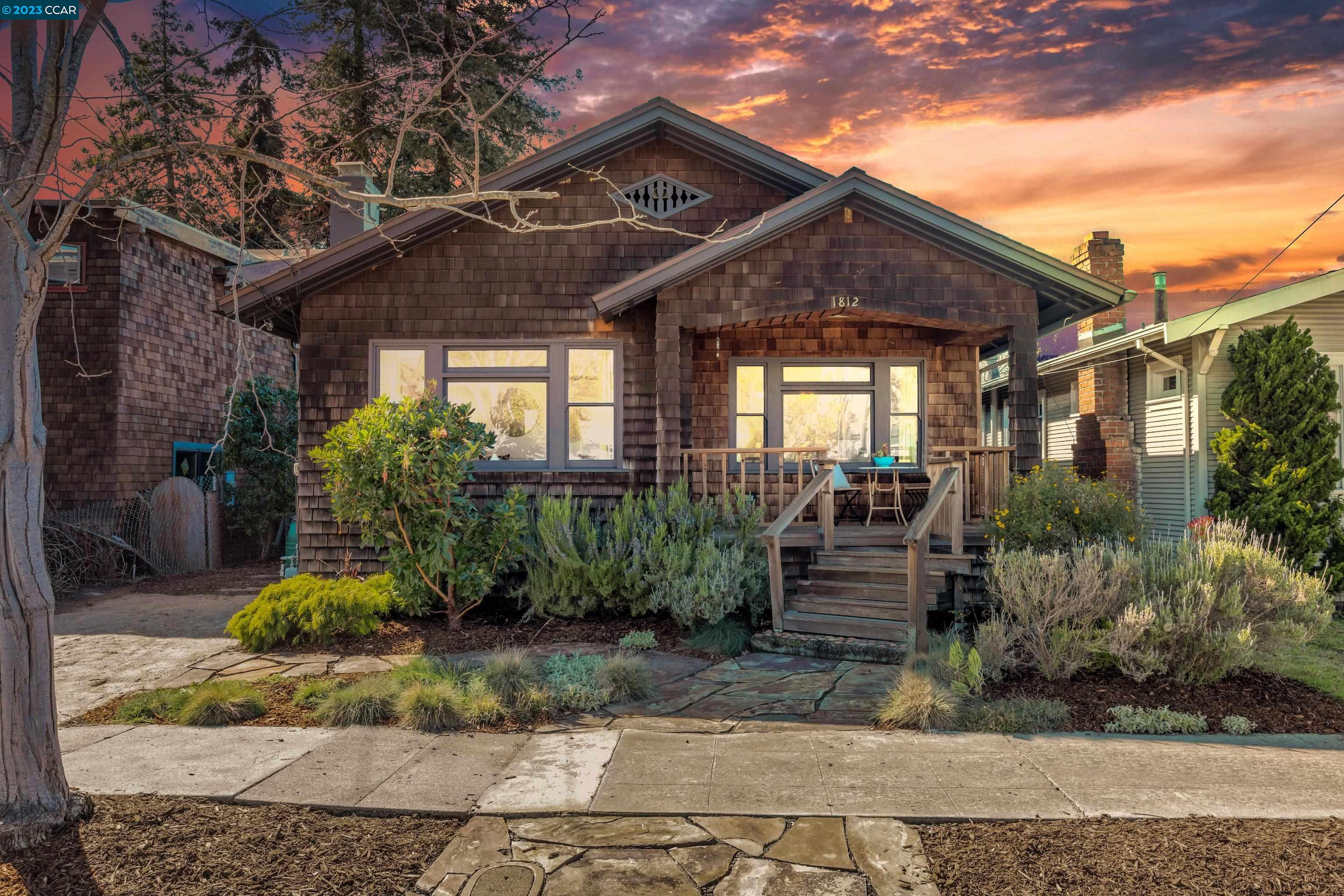 front view of a house with a small yard