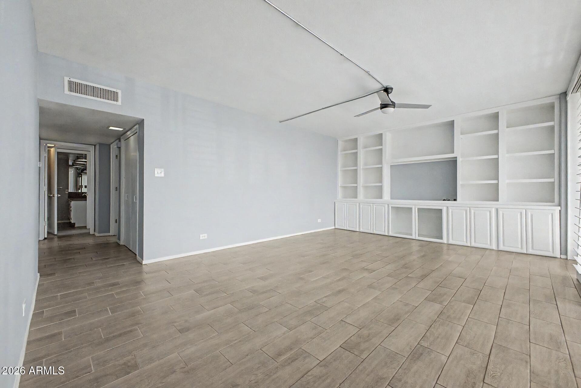 207 West Clarendon Avenue, Unit B2 Phoenix, AZ 85013 - Photo 1 of 30 a view of an empty room with a window