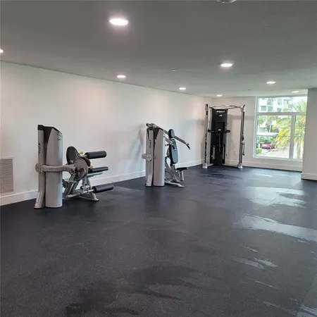 a view of a room with gym equipment